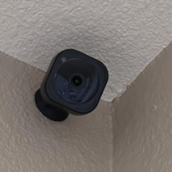 Customer testimonial about GuardHouse 3-pack security cameras providing wide-angle coverage, reducing blind spots, and protecting indoor and outdoor areas.